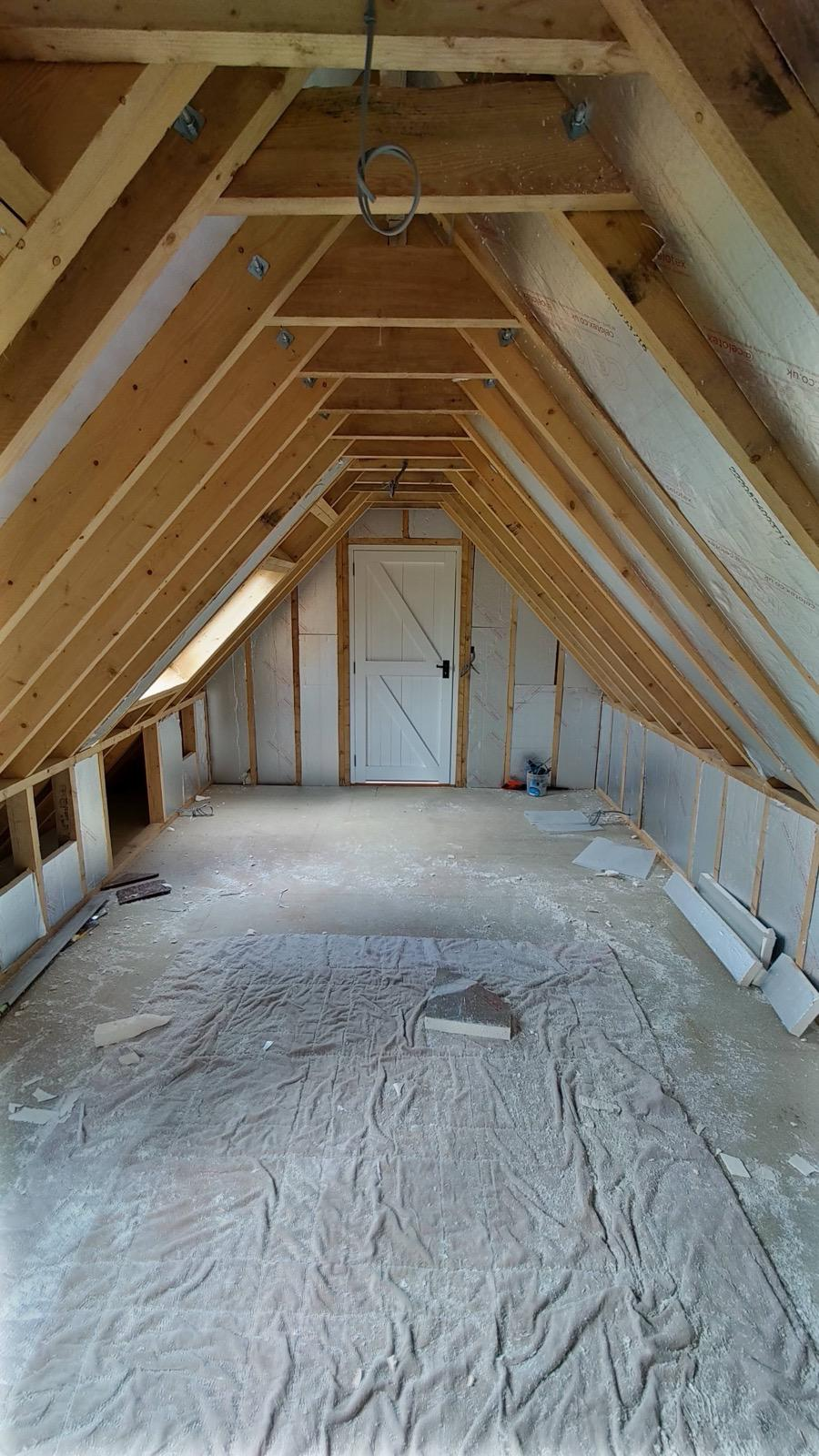 Insulated timber-framed loft room prepared for plasterboard
