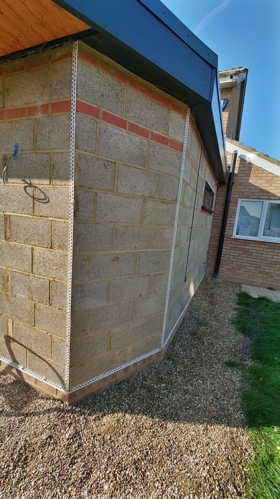 Blockwork extension corner fitted with render beads